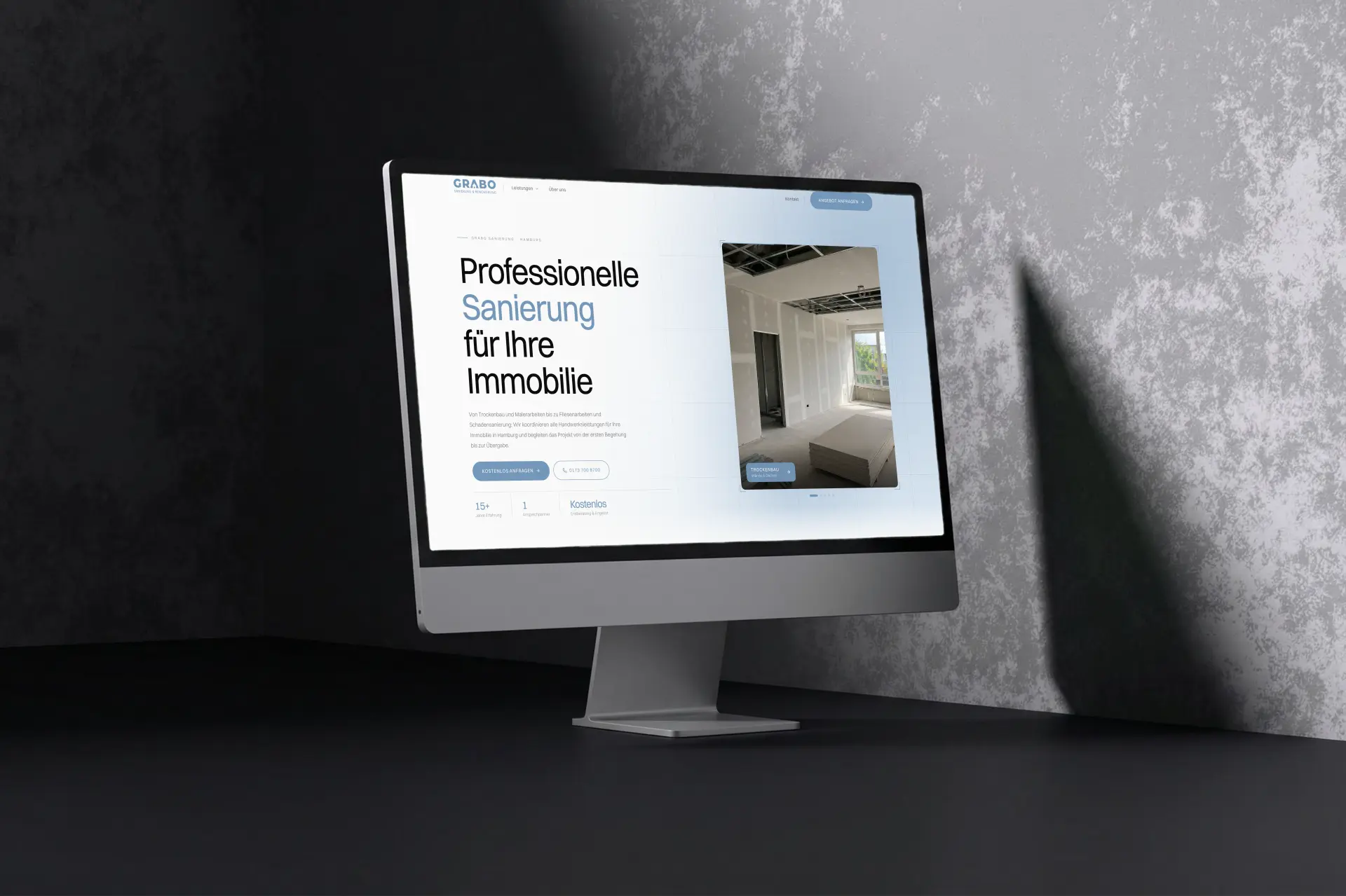 Startseite von Grabo Sanierung auf einem großen Monitor