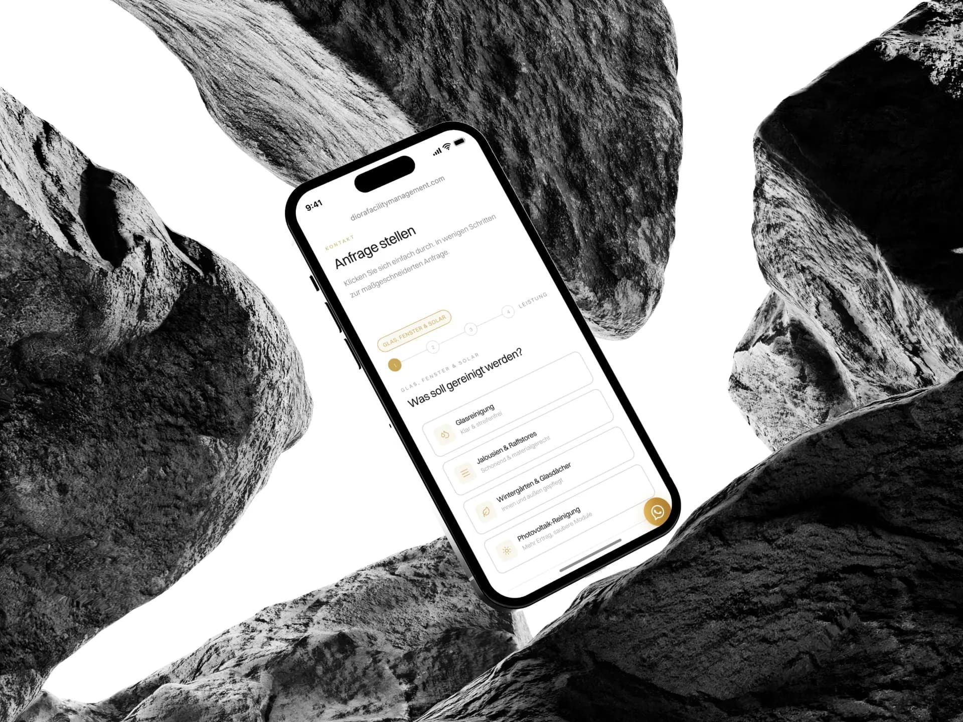 Anfrage stellen von Diora Facility Management auf einem Smartphone zwischen Felsen
