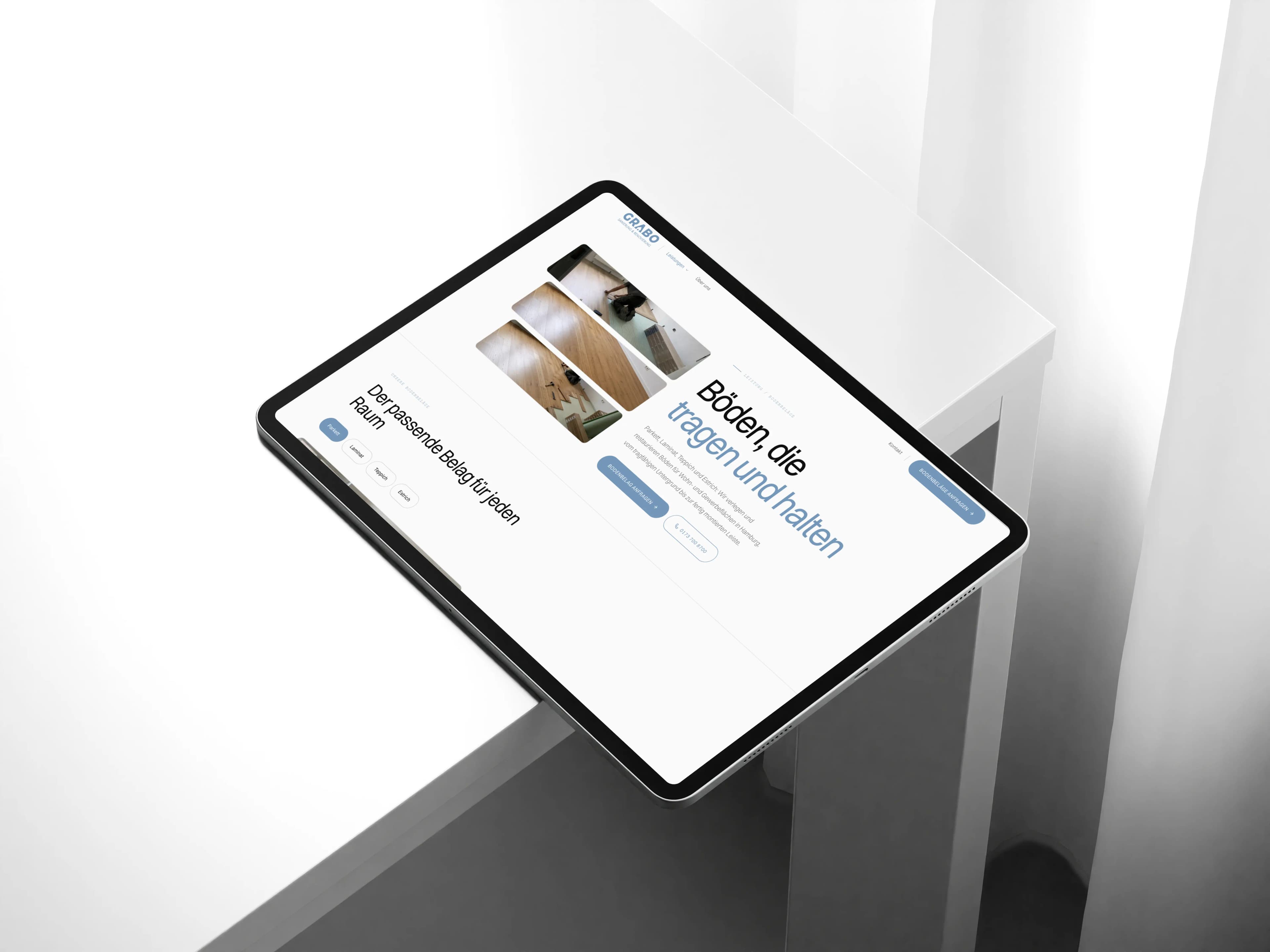 Seite zu Bodenbelägen von Grabo Sanierung mit dem Titel Böden, die tragen und halten auf einem Tablet